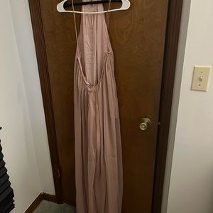 Blush colored, (like a very soft pink), Halter jumpsuit wide leg.